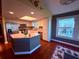 Well-equipped kitchen featuring stainless steel appliances, ample cabinetry, and an island with seating at 3338 Fernleaf Dr, Hernando Beach, FL 34607