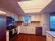Bright kitchen features stainless steel appliances, ample counter space, and a window with natural light at 3338 Fernleaf Dr, Hernando Beach, FL 34607