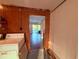 View of the laundry room showing a washer and dryer with access to the pool area at 3338 Fernleaf Dr, Hernando Beach, FL 34607