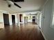Open living area featuring tile floors leading into the updated kitchen with stainless appliances at 3338 Fernleaf Dr, Hernando Beach, FL 34607