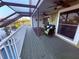 Outdoor patio with lake views and comfortable seating at 3338 Fernleaf Dr, Hernando Beach, FL 34607