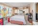 Cozy bedroom features storage and bright window with unique curtains at 3405 E Diana St, Tampa, FL 33610