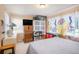 Bright bedroom offers natural light and comfortable interior at 3405 E Diana St, Tampa, FL 33610