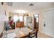 Bright eat-in kitchen area features natural light, tile floors, and access to other rooms at 3405 E Diana St, Tampa, FL 33610