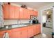 This traditional kitchen offers plenty of cabinet space and built-in appliances at 3405 E Diana St, Tampa, FL 33610