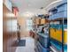 Ample bedroom storage with built-in shelves and cabinetry offers practical organization in neutral colored room at 3405 E Diana St, Tampa, FL 33610
