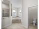 This bathroom provides a walk-in shower, soaking tub, and private toilet at 34652 Heavenly Ln, Dade City, FL 33525