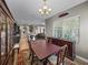 Open-concept dining room with access to the kitchen and living area at 34652 Heavenly Ln, Dade City, FL 33525