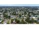 Aerial view of a single-Gathering home in a tranquil neighborhood with mature trees at 3547 55Th N St, St Petersburg, FL 33710