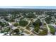 Aerial view of a home nestled in a peaceful, tree-lined residential neighborhood at 3547 55Th N St, St Petersburg, FL 33710