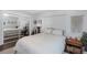 Bright bedroom with a mirrored closet, a cozy bed, and warm decor at 3547 55Th N St, St Petersburg, FL 33710
