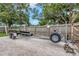Heavy duty boat trailer on gravel in the backyard at 3547 55Th N St, St Petersburg, FL 33710