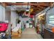 Spacious garage with overhead storage and ample space for parking and storage at 3547 55Th N St, St Petersburg, FL 33710