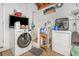 Bright Laundry room featuring modern washer, dryer, and ample storage at 3547 55Th N St, St Petersburg, FL 33710