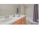Bathroom with double sinks, tub and shower at 3862 Tristram Loop, Land O Lakes, FL 34638