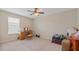 Bedroom with a ceiling fan and vanity at 3862 Tristram Loop, Land O Lakes, FL 34638