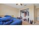 Bedroom with a ceiling fan and walk-in closet at 3862 Tristram Loop, Land O Lakes, FL 34638