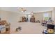 Spacious carpeted bonus room with abundant natural light and a ceiling fan at 3862 Tristram Loop, Land O Lakes, FL 34638