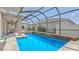 Relax in this home's refreshing pool and spa under the screened-in lanai at 3862 Tristram Loop, Land O Lakes, FL 34638