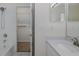 Bathroom featuring a shower, tub, vanity and an open door looking into an adjacent room at 4228 Savage Station Cir, New Port Richey, FL 34653