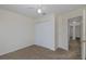Bedroom featuring neutral carpet, ceiling fan and a large closet at 4228 Savage Station Cir, New Port Richey, FL 34653