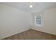 Bedroom with neutral carpet, ceiling fan and a window seat at 4228 Savage Station Cir, New Port Richey, FL 34653
