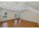Spacious living room featuring hardwood floors, and a view of the outdoors at 4228 Savage Station Cir, New Port Richey, FL 34653