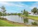 This home has a beautiful view of a pond, which adds to the overall appeal of the property at 4228 Savage Station Cir, New Port Richey, FL 34653