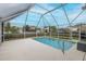 Screened in pool with ample deck space and clear view of the sky at 4228 Savage Station Cir, New Port Richey, FL 34653