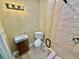 Cozy bathroom featuring a glass-enclosed shower and updated fixtures at 440 89Th Ave, St Pete Beach, FL 33706