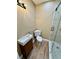 Cozy bathroom featuring a glass-enclosed shower and updated fixtures at 440 89Th Ave, St Pete Beach, FL 33706