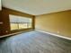 Bright living room with tile floors, large window, and neutral wall color, creating an inviting and spacious atmosphere at 440 89Th Ave, St Pete Beach, FL 33706