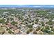 Expansive aerial shot captures a vibrant cityscape, interwoven with lush green spaces and serene waterways at 513 88Th N Ave, St Petersburg, FL 33702