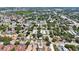 Expansive aerial view of a residential neighborhood with tree-lined streets and diverse housing styles in a vibrant community at 513 88Th N Ave, St Petersburg, FL 33702