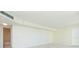 A primary room featuring a partial view of a bathroom and a door at 5505 Puerta Del Sol S Blvd # 321, St Petersburg, FL 33715