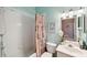 Bright bathroom featuring a shower-tub combination and a decorative shower curtain at 5704 Eaglemount Cir, Lithia, FL 33547