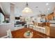 Open concept living space that flows from the dining area into the kitchen and living room at 5704 Eaglemount Cir, Lithia, FL 33547