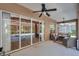 Relaxing outdoor patio with comfortable seating and a view of the screened-in pool at 5704 Eaglemount Cir, Lithia, FL 33547