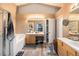 Spacious bathroom with double sinks, soaking tub, glass shower, and modern fixtures at 5860 War Admiral Dr, Wesley Chapel, FL 33544