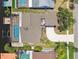 Overhead view of the property, showing the pool, boat lift, and roof at 6119 Galleon Way, Tampa, FL 33615