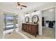 Bright bathroom features a large vanity and soaking tub with sliding glass doors to patio at 6119 Galleon Way, Tampa, FL 33615