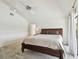 Bright bedroom features a large bed with an adjacent door and windows with curtains at 6119 Galleon Way, Tampa, FL 33615