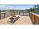 Relax on this deck with a lounge chair and enjoy the peaceful waterfront views at 6119 Galleon Way, Tampa, FL 33615
