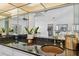Open kitchen with granite countertops, stainless steel fixtures, and views into the living area at 6119 Galleon Way, Tampa, FL 33615