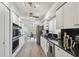Spacious kitchen features stainless appliances, granite countertops, and a stylish design at 6119 Galleon Way, Tampa, FL 33615