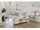 Spacious living area features a fireplace, waterfront views and bar seating at 6119 Galleon Way, Tampa, FL 33615