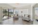 Cozy sun room with natural light and peaceful views of the surrounding landscape at 6119 Galleon Way, Tampa, FL 33615