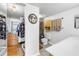 Bathroom features a walk-in closet, tile shower with glass door, and toilet at 6265 Sun Blvd # 605, St Petersburg, FL 33715