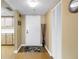 Entryway with a white door, closet, and wooden flooring at 6265 Sun Blvd # 605, St Petersburg, FL 33715