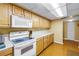 Functional kitchen with white appliances, ample cabinets, and durable countertops, ready for culinary adventures at 6265 Sun Blvd # 605, St Petersburg, FL 33715